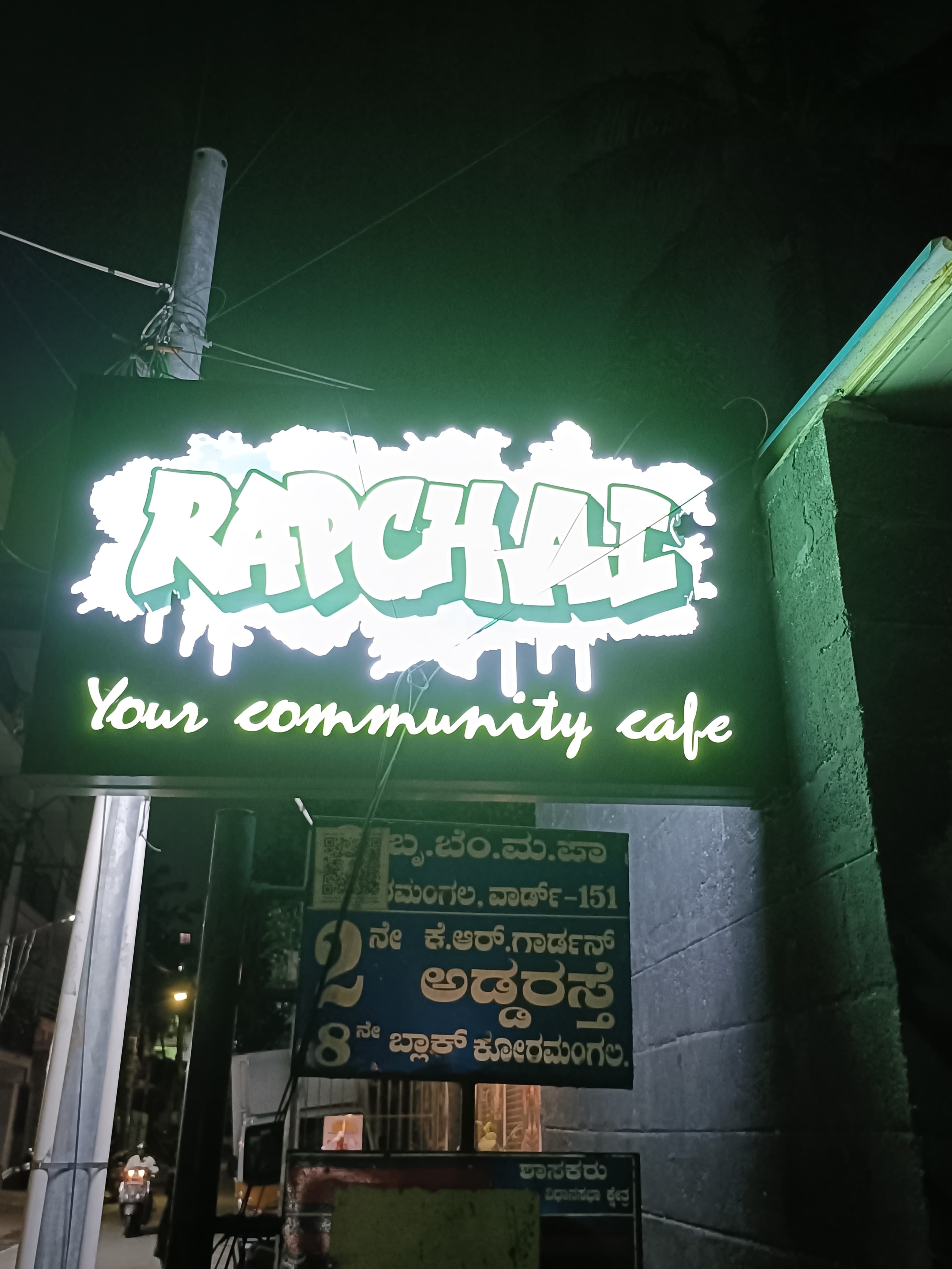 Rapchai neon sign — Your community café